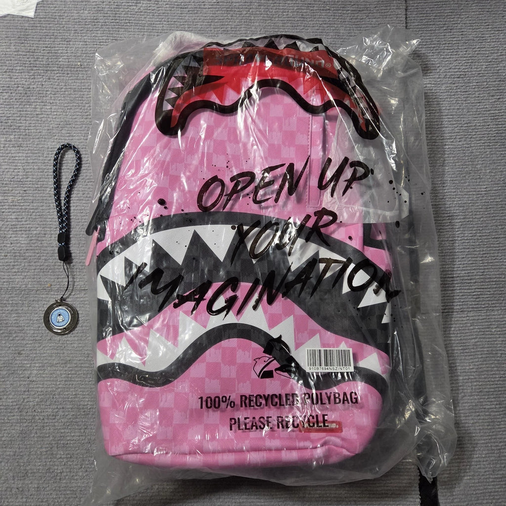 Sprayground Pink And Black Drip Check DLXSV Backpack
